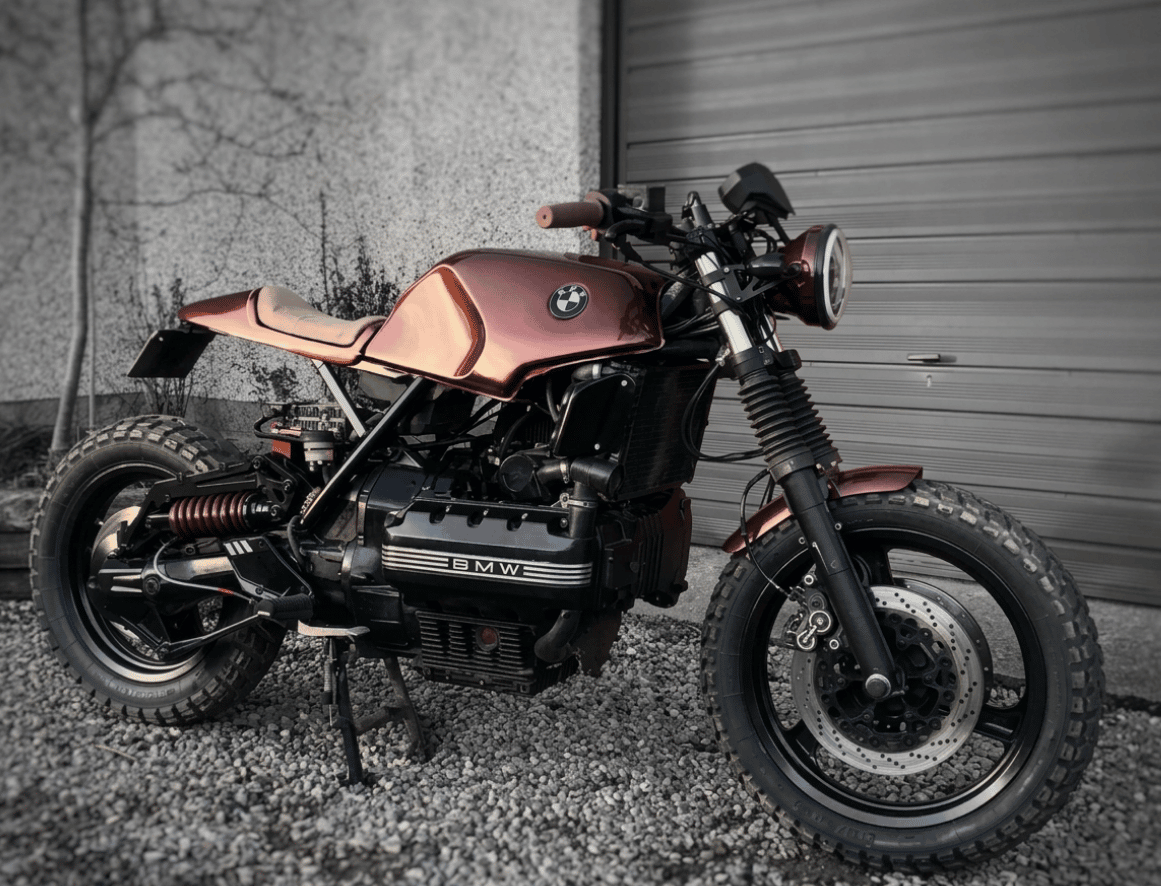 Custom-built maroon BMW K100 cafe racer with bobbed seat and clip-on bars